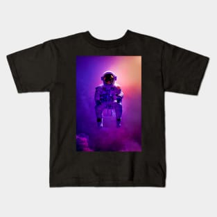 Astronaut sitting on a chair in space Kids T-Shirt